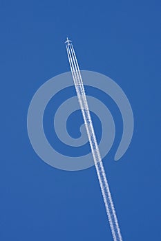 A plane with a condensation trail