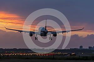 Plane is flying above the runway.