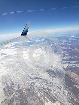 Plane flying alaska airlines snow
