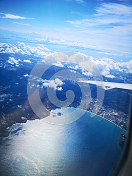 In the plane flying blue sky