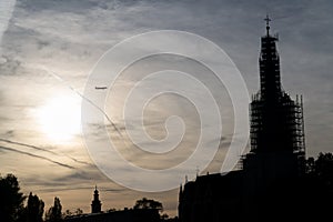 Plane flying into a building under construction