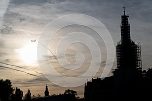 Plane flying into a building under construction