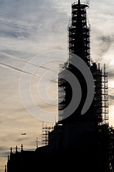 Plane flying into a building under construction