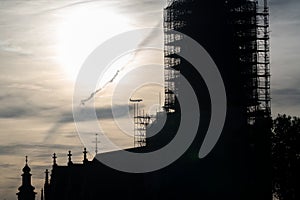 Plane flying into a building under construction