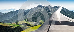 Plane flying over mountainous area