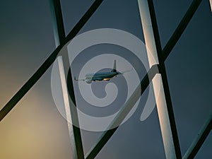 Plane in front of airport window