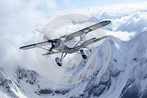 the plane hangs over mountains with snow