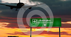 Plane landing in Bamako Mali airport with signboard