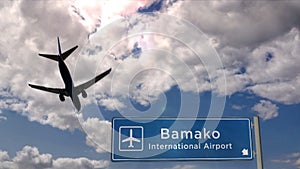 Plane landing in Bamako Mali airport with signboard