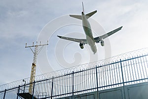 Plane landing with blue sky