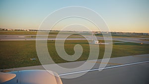 Plane landing into Chicago International Airport. Wide shot