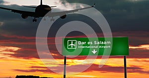 Plane landing in Dar es Salaam Tanzania airport with signboard