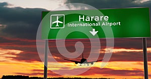 Plane landing in Harare Zimbabwe airport with signboard