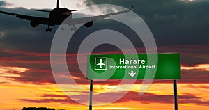 Plane landing in Harare Zimbabwe airport with signboard