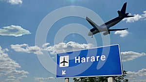 Plane landing in Harare Zimbabwe airport with signboard