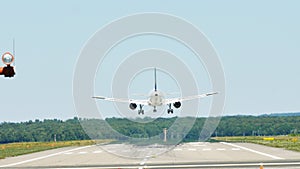 Plane landing on runway