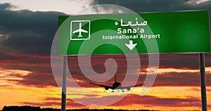 Plane landing in Sana`a, Sanaa Yemen airport with signboard