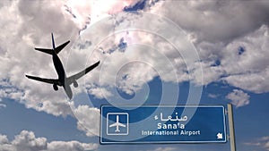 Plane landing in Sana`a, Sanaa Yemen airport with signboard