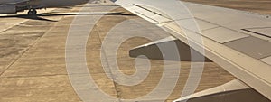 The plane lands on the airfield. Spoilers and flaps trailing edge when landing. photo
