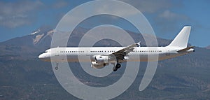 The plane lands.Airplane, passengers flying in the blue sky, preparing to land at the airport