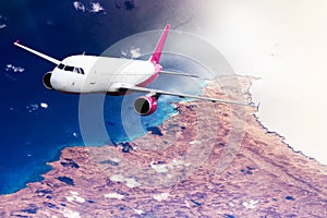 Plane mauve pink sky cloud travel transportion airplane mountains