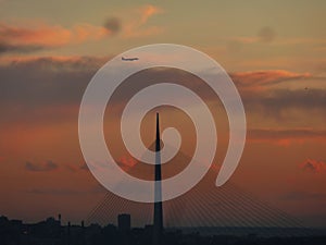 Plane over the bridge before landing