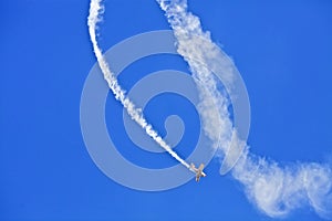 A plane performs aerobatics photo