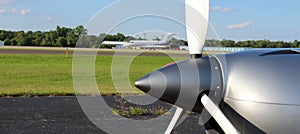 Plane propeller with jet in background in Michigan