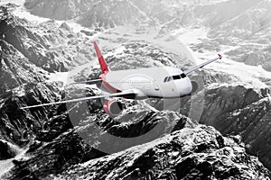 Plane red black white travel transportion airplane mountains