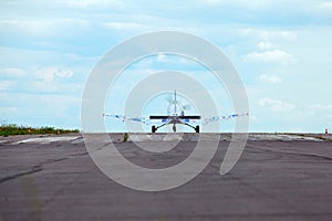 Plane on the runway against the blue sky