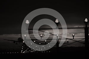 Plane in the sky, landing on runway