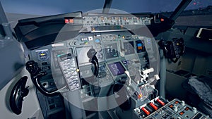 Plane`s cockpit view from a pilot`s seat