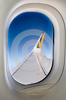 A plane's wing out of the window