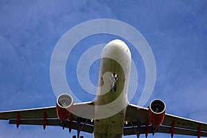 A plane from the side approaching for landing