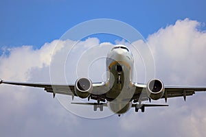 A plane from the side approaching for landing.