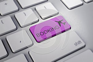 Plane sign on keyboard, to illustrate online booking or purchase of ticket business travel concepts.