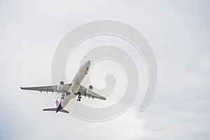 Plane in the sky taking off or landing