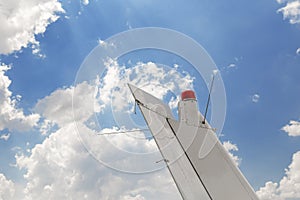 Plane tail against blue sky