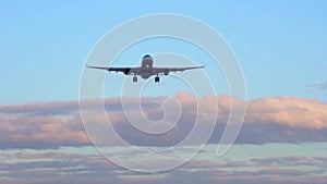 Plane takes off, landing. Large commercial plane flies overhead daytime close-up