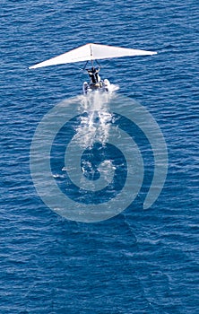 Plane takes off from the surface of the water