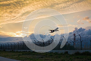 Plane taking off in Barcelona airport, Catalonia, Spain.