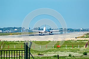 Plane taking off in Barcelona airport el Prat Josep Tarradellas, Catalonia, Spain.