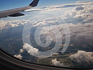 Plane taking off with cloudy sky