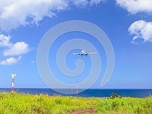 plane taking off over the easterly island coast