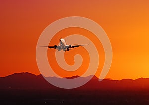 Plane taking off at sunset, Arizona