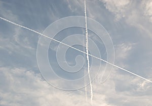 Plane trails in the summer sky