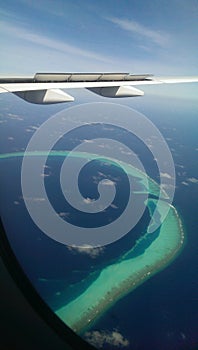 Plane view to Maldivian atoll