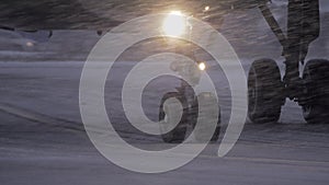 Plane wheels on runaway in heavy snowfall