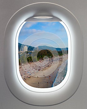 Plane window Aerial view of a Beach Phuket Thailand