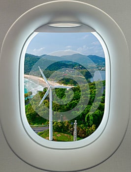 Plane window Aerial view of a Beach Phuket Thailand